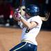 Michigan senior Ashley Lane hits a walk-off home run in the eighth inning of the game against Louisiana-Lafayette on Friday, May 24. Daniel Brenner I AnnArbor.com
